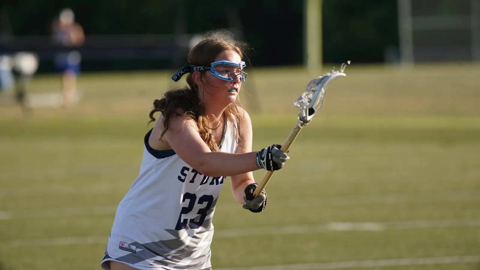 A KC Storm player with the ball at a tournament