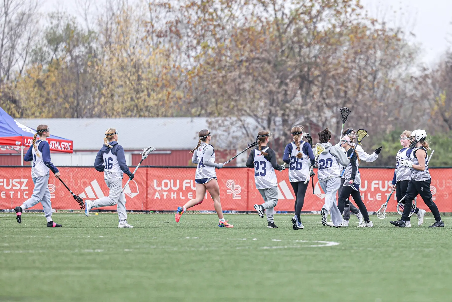 KC Storm players moving upfield at a tournament