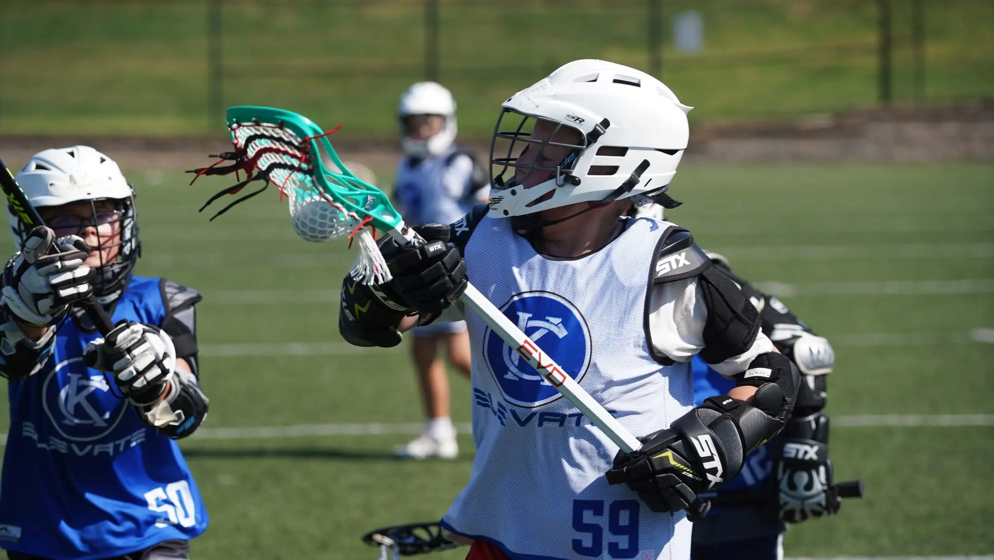KC Elevate boys in the blue and white Elevate jerseys during a game