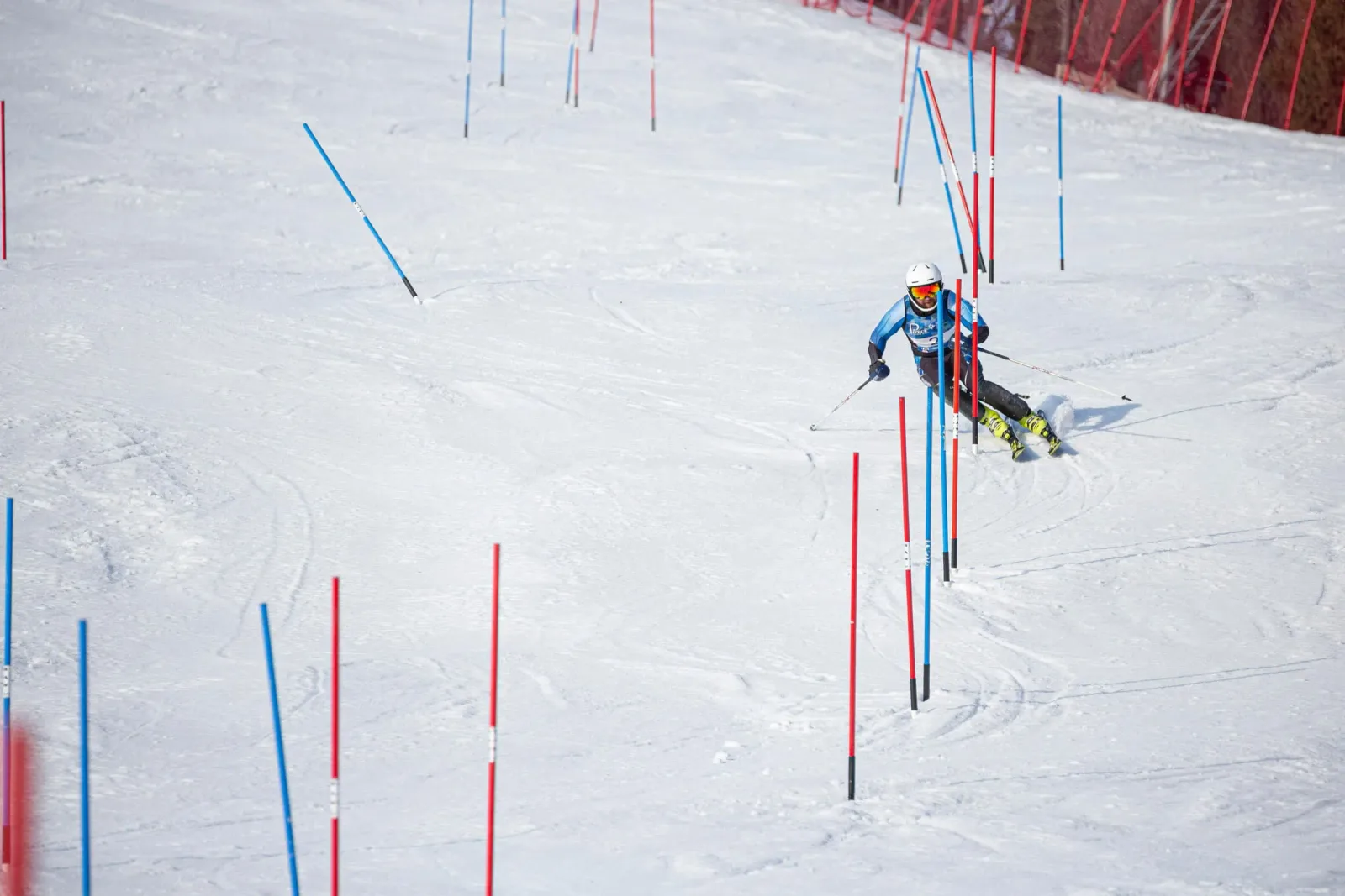 A Team Gilboa racer carving through slalom gates