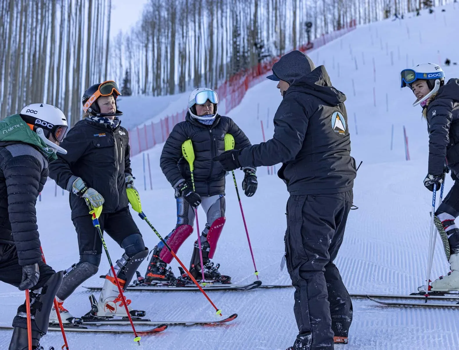 A Team Gilboa coach talking tactics with athletes at Vail