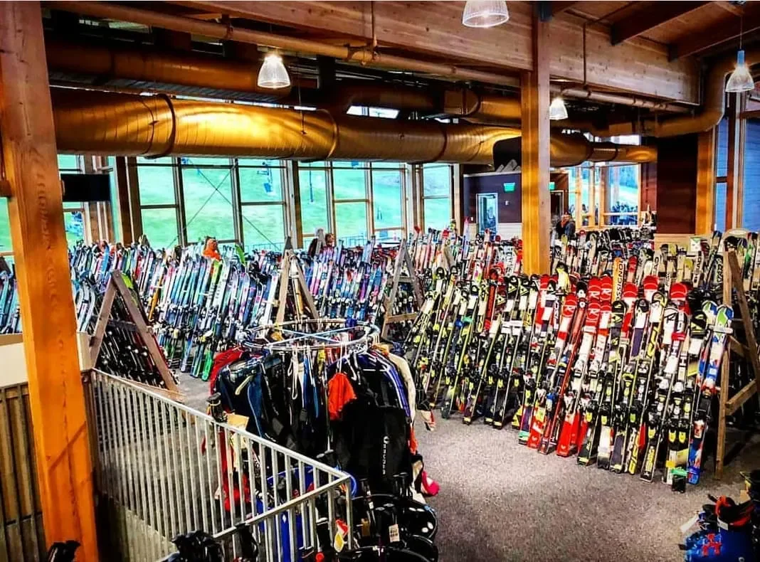 Racks of skis and gear at the Hyland Ski and Snowboard Swap