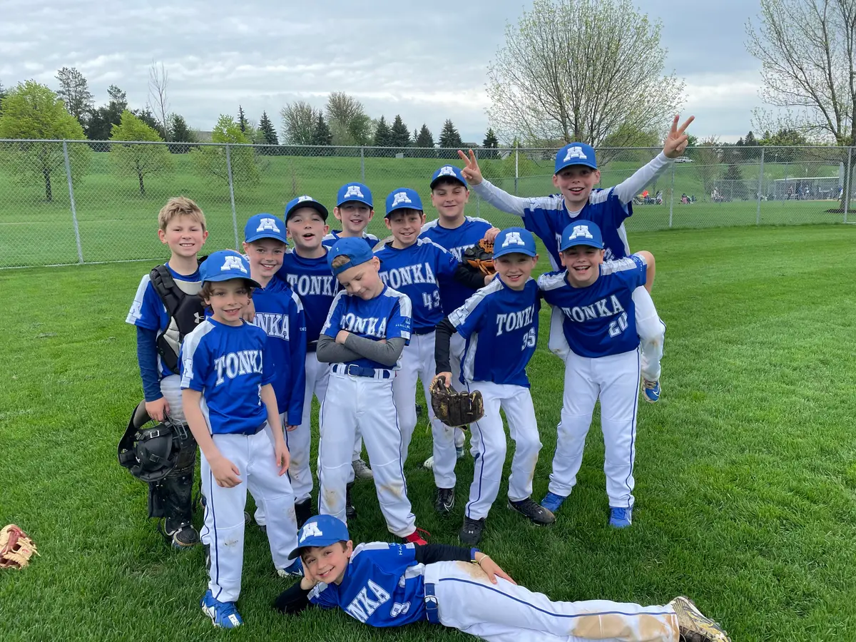 An MBA 10-year-old travel team celebrating together